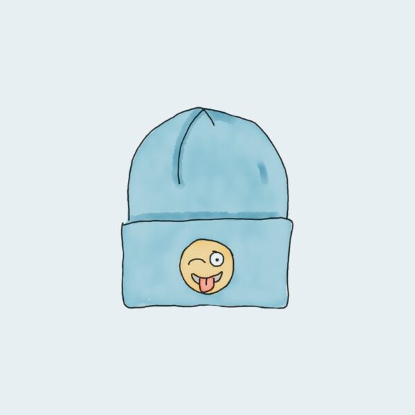 A blue beanie with an image of a smiley face on it.